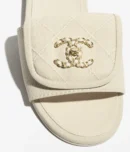 CHANEL BEIGE SLIDES